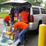 Swaminarayan Vadtal Gadi, SVG-Charity-Donated-1800-pounds-of-food-and-water-to-the-Houston-Food-Bank-By-Vadtal-Dham-Houston-USA-4.jpg